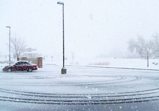 manage-snow-and-ice-to-preserve-asphalt-parking-lot.jpg